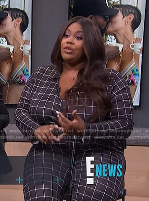 Nina’s black grid check jumpsuit on E! News Daily Pop