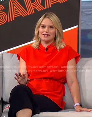 Sara’s red tie waist top on GMA Strahan And Sara