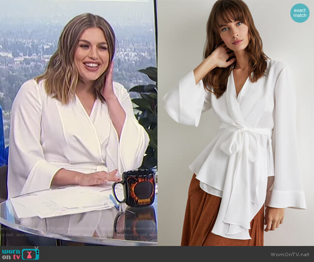 WornOnTV Carissa s white wrap top on E News Daily Pop Carissa