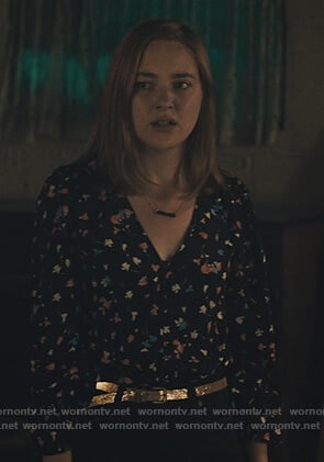 Violet’s black floral button down blouse on Light as a Feather