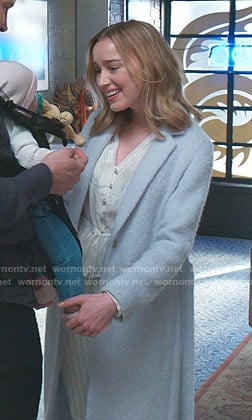 Clare's v-neck blouse and blue wrap coat on Younger