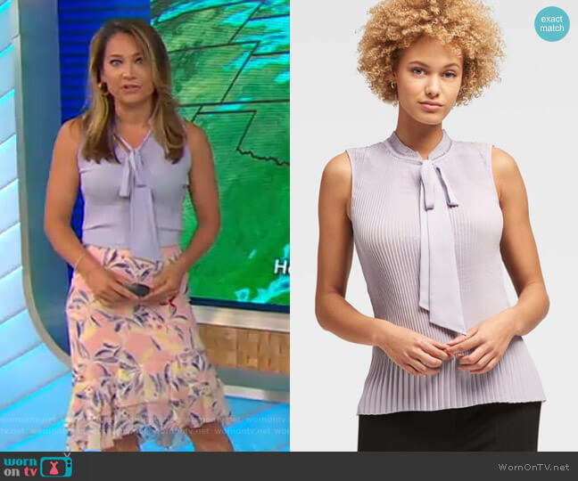 WornOnTV: Ginger’s purple tie neck top and printed skirt on Good ...
