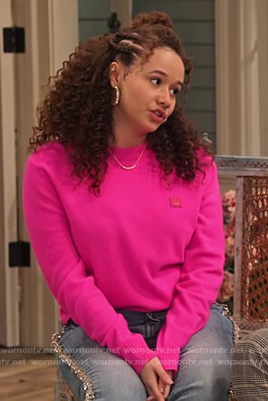 Jade's pink face sweater on Family Reunion