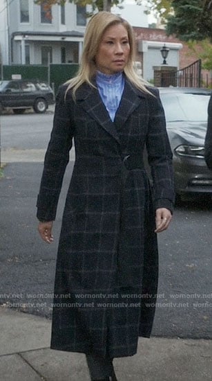 Joan’s long checked coat on Elementary