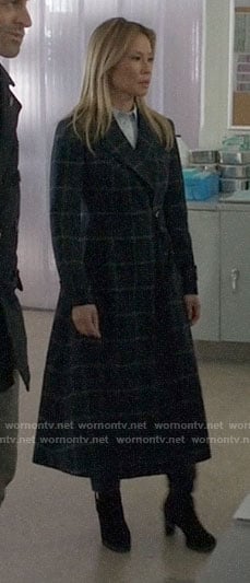 Joan's long checked coat on Elementary