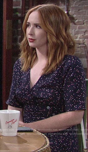 Mariah’s navy polka buttoned wrap dress on The Young and the Restless