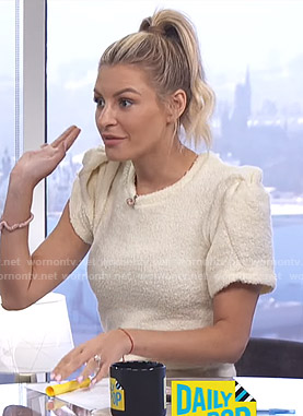 Morgan’s white knotted short sleeve top on E! News Daily Pop