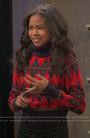 Nia's red argyle sweater on Ravens Home