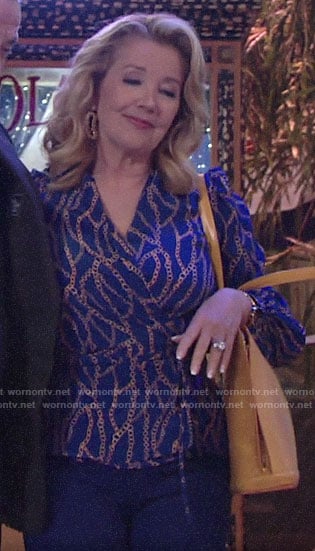 Nikki's blue chain print blouse on The Young and the Restless