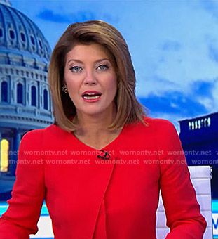 Norah’s red pleated jacket on CBS Evening News