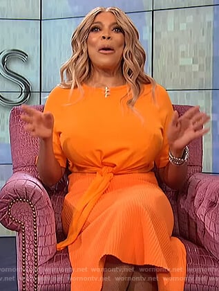 Wendy’s orange tie front top and skirt on The Wendy Williams Show