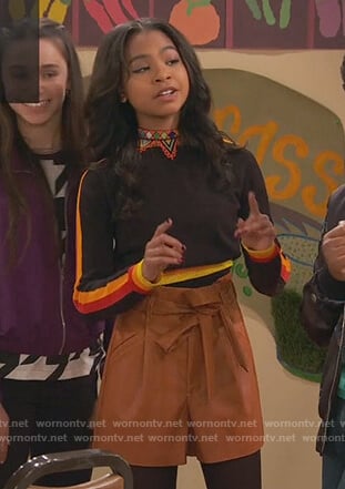 Nia’s black striped cropped sweater  on Ravens Home