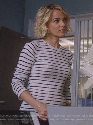 Lizzie’s white striped sweater on Instinct