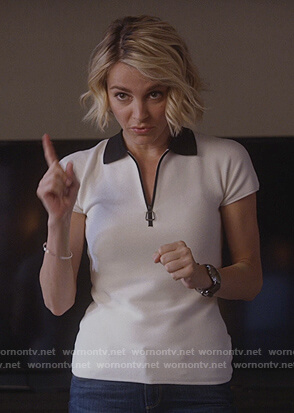 Lizzie’s white contrast collar polo shirt on Instinct