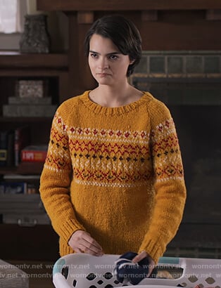 Elodie's yellow knit sweater on Trinkets