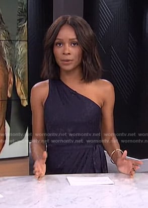 Zuri’s navy one-shoulder dress on E! News