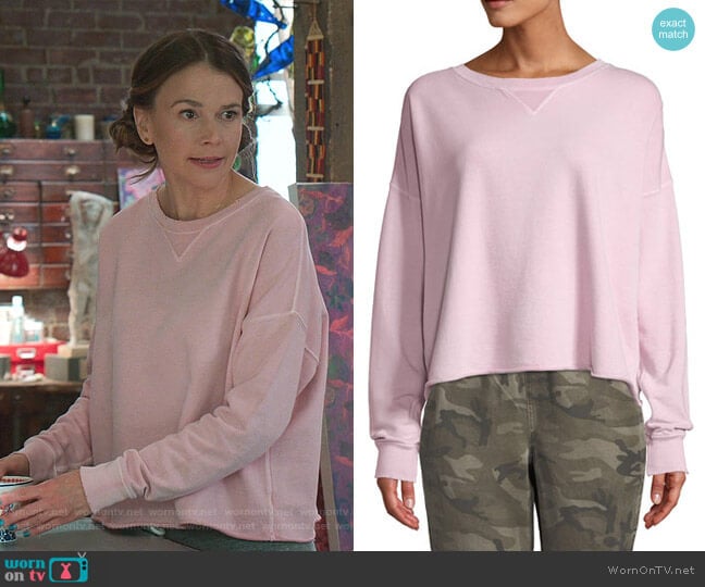 Cropped Raw-Edge Pullover Sweatshirt by AMO Denim worn by Liza Miller (Sutton Foster) on Younger