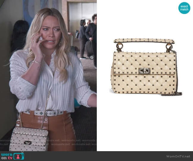 Medium Rockstud Matelassé Quilted Leather Crossbody Bag by Valentino worn by Kelsey Peters (Hilary Duff) on Younger