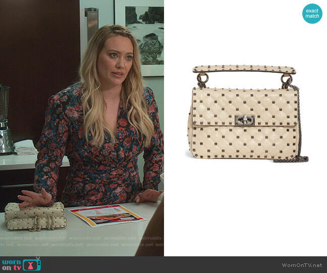 Medium Rockstud Matelassé Quilted Leather Crossbody Bag by Valentino worn by Kelsey Peters (Hilary Duff) on Younger