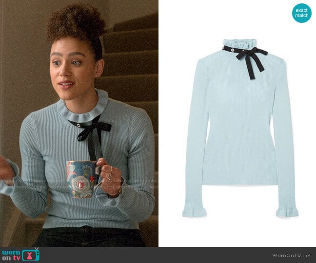 RED Valentino Grosgrain-trimmed wool sweater worn by Maya (Nathalie Emmanuel) on Four Weddings and a Funeral