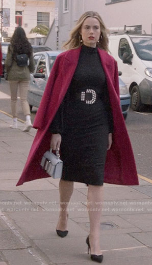 Ainsley’s black dress with pleated sleeves and pink coat on Four Weddings and a Funeral