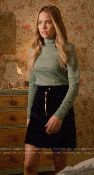 Ainsley's metallic green mock neck sweater on Four Weddings and a Funeral