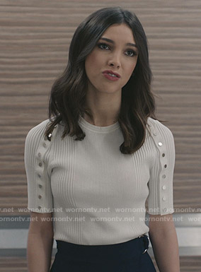 Alicia's white ribbed button detail top on Grand Hotel