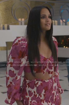 Carolina's white and pink floral cropped top and skirt on Grand Hotel