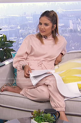 Erin’s pink sweatshirt jumpsuit on Live from E!