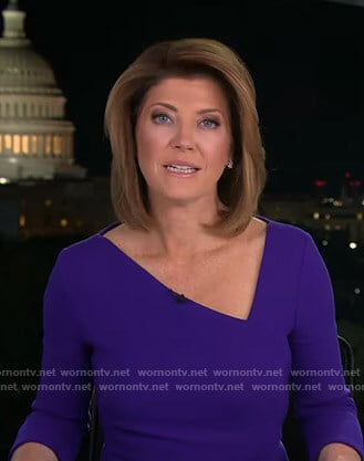 Norah’s blue asymmetric v-neck dress on CBS Evening News