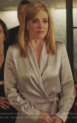 Kelly Anne’s violet satin wrap top on Queen of the South