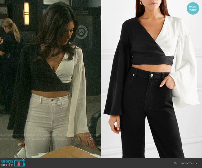 Staud Cropped two-tone crepe de chine wrap top worn by Gabi Hernandez (Camila Banus) on Days of our Lives