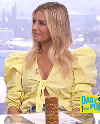 Morgan's yellow puff sleeve top on E! News Daily Pop