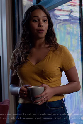 Jessica’s mustard v-neck tee on 13 Reasons Why