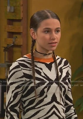 Tess’s white zebra sweater on Ravens Home