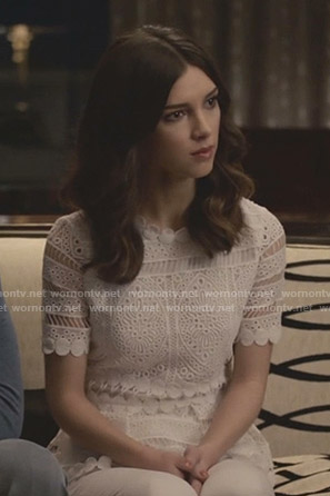 Alicia's white lace embroidered top on Grand Hotel