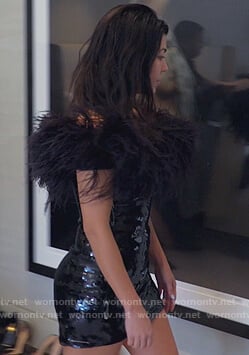 Kourtney's feather embellished mini dress on Keeping Up with the Kardashians