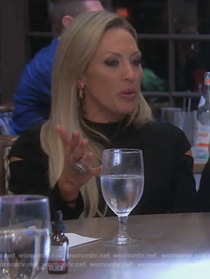 Braunwyn’s black sleeve cutout dress on The Real Housewives of Orange County