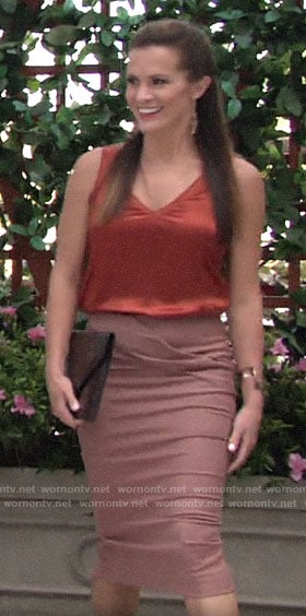 Chelsea's orange v-neck top and pink pencil skirt on The Young and the Restless