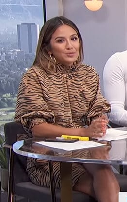 Erin’s beige tiger print top and shorts on E! News Daily Pop