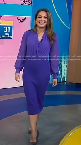 Ginger’s purple wrap blouse and pencil skirt on Good Morning America