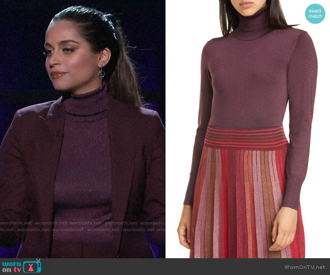 Kate Spade Metallic Ribbed Turtleneck worn by Lilly Singh on A Little Late with Lilly Singh