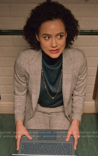 Maya's plaid suit and draped top on Four Weddings and a Funeral