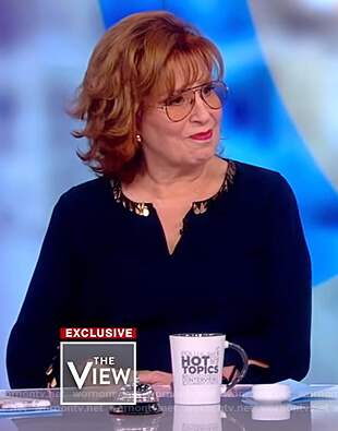 Joy's navy embellished blouse on The View