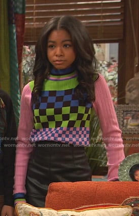 Nia’s mixed checkerboard sweater on Ravens Home