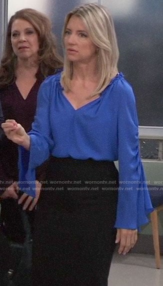 Nina’s blue bell-sleeve blouse on General Hospital