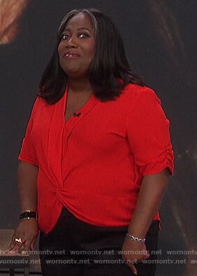 Sheryl’s red twisted top on The Talk