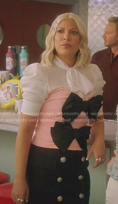 Tori’s pink bow detail bustier top and black skirt on BH90210