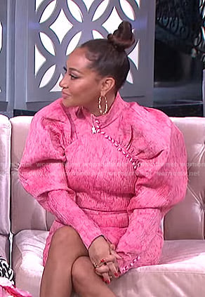 Adrienne’s pink puff sleeve mini dress on The Real