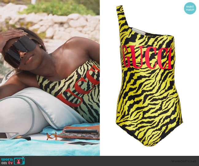 Malika's Gucci tiger stripe swimsuit on Keeping Up with the Kardashians